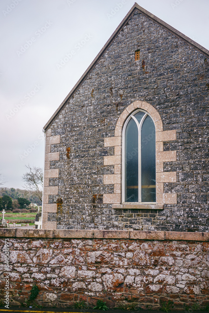 Fototapeta premium Beautiful house on the coast of Jersey Island in UK, Channel Islands