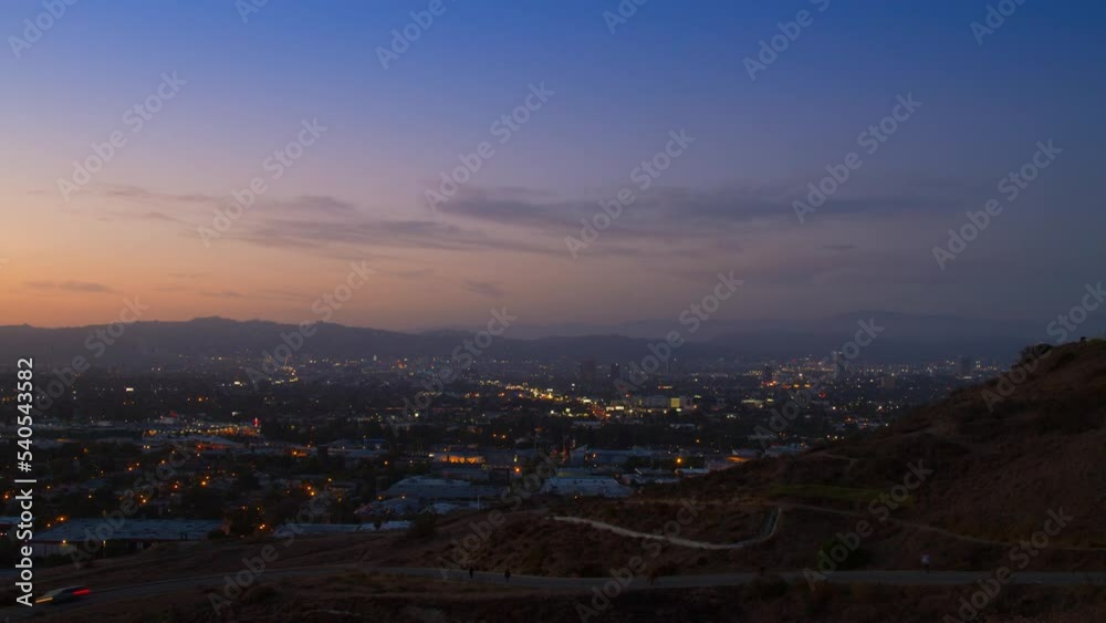 Time Lapse Lockdown Shot Of Buildings In City Amidst Mountains From Sunset To Dusk - Santa Monica, California Time Lapse Lockdown Shot Of Buildings In City Amidst Mountains From Sunset To Dusk - Santa Monica, California