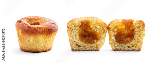 Freshly baked muffins with apricot jam filling isolated on white