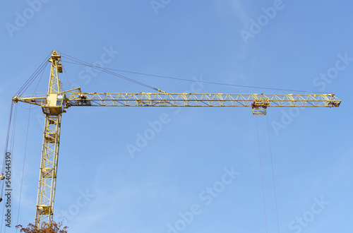 Crane tower at the construction site of a residential building