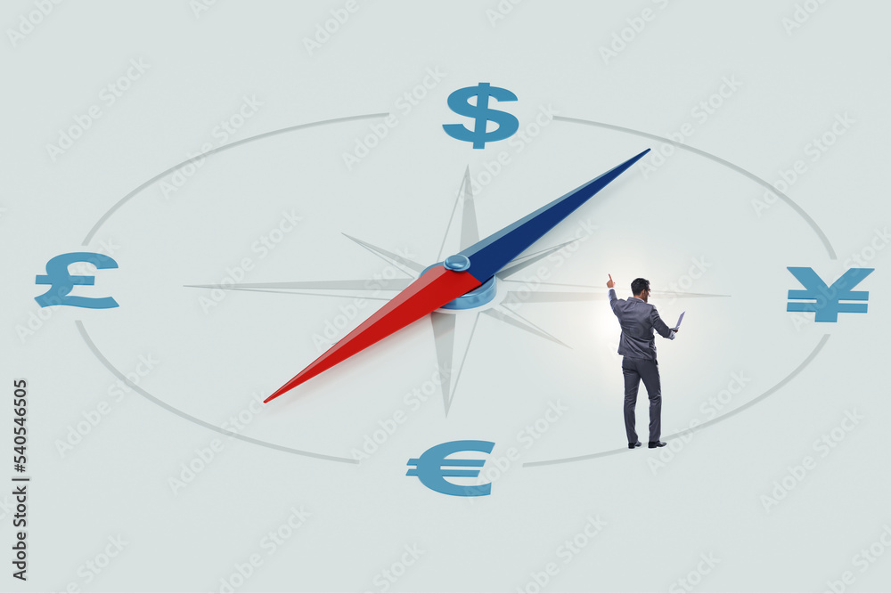 Fototapeta premium Businessman in currency trading concept with compass