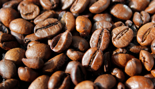 roasted coffee beans background, close-up of roasted coffee beans, brown coffee beans texture