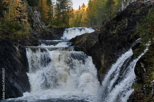Stormy stream of Kivach waterfall in autumn Karelia
