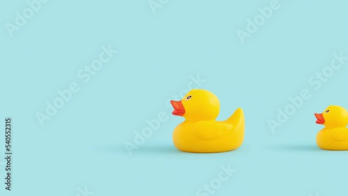Minimal concept with yellow ducks toy in a row 4k.
