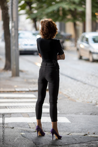 woman prostitute waiting for client on street