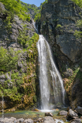 Beautiful Theth waterfall near Theth village in Albanian alps mountains
