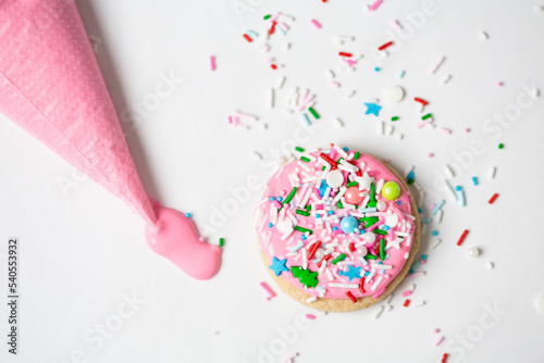 Cookies Decorated with Pink Icing and Sprinkles