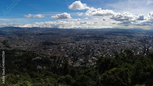 Incredible wide-angle view from the Cerro de Monserrate over the impressive Bogota skyline photo