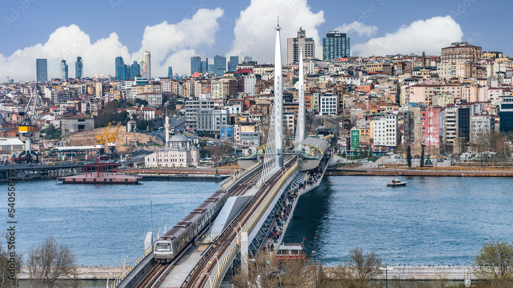 Panoramic view of Golden Horn Halic Metro Bridge in Istanbul, Turkey. It is a cable stayed bridge carrying the M2 line of the Istanbul Metro across the Golden Horn