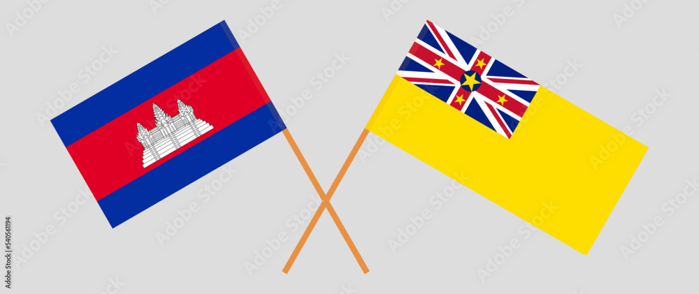 Crossed flags of Cambodia and Niue. Official colors. Correct proportion