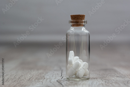 Pills in the glass phial.