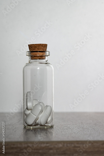 Pills in the glass phial.