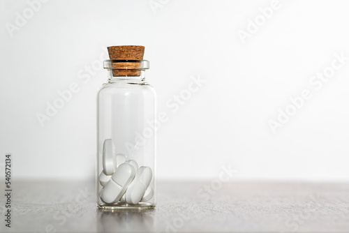 Pills in the glass phial.