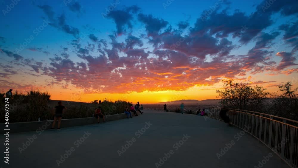 Time Lapse Lockdown Shot Of People Doing Exercise In Park On Mountain Under Cloudy Sky At Sunset - Rocky Mountain National Park, Colorado Time Lapse Lockdown Shot Of People Doing Exercise In Park On Mountain Under Cloudy Sky At Sunset - Rocky Mountain National Park, Colorado