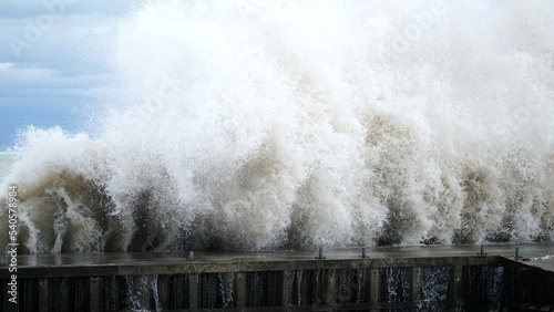 A wave crashes into a break wall along Lake Michigan’s shoreline at Tower Beach in Winnetka, Illinois, on a very windy day.