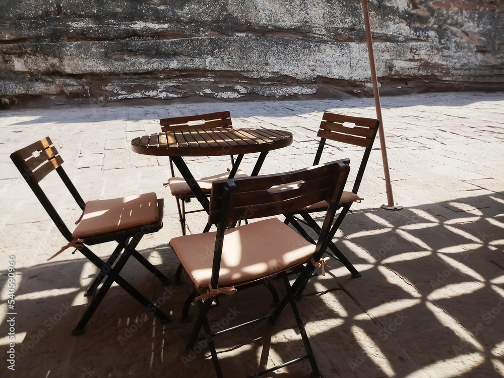 Table and chairs for tourists at Mehrangarh fort restaurant, Jodhpur, Rajasthan, India.