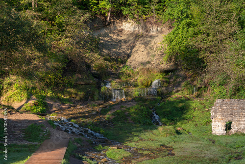 View of the Slovenian Streams (Streams of the Twelve Apostles) in the Izborsko-Malskaya Valley on a sunny summer morning, Izborsk, Pechersk district, Pskov region, Russia photo