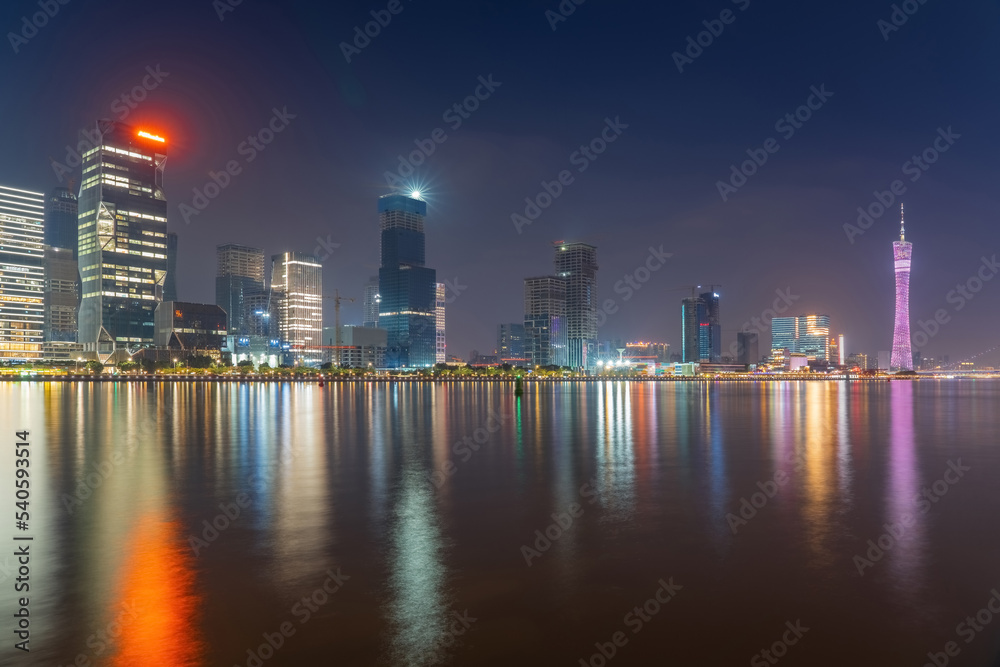 Obraz premium The skyline of urban architecture and the night view of the ancient canal in Guangzhou, China