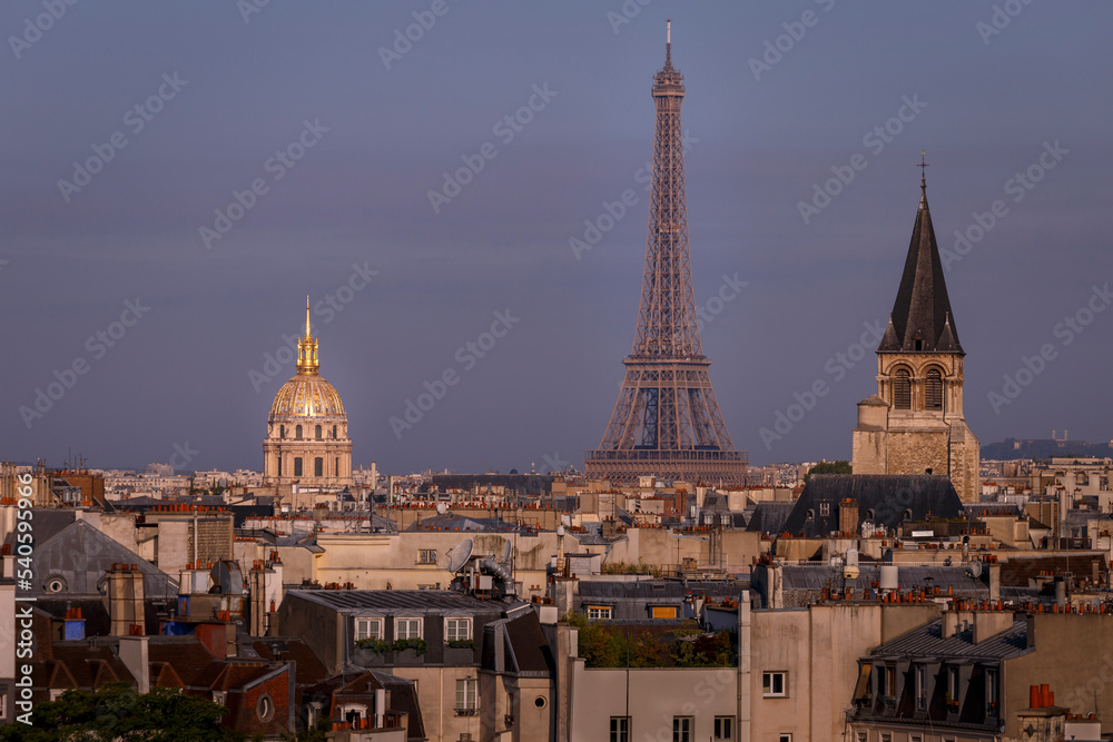 Eiffel tower and Les Invalides at golden sunrise, Paris cityscape, France