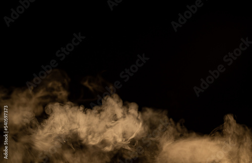 yellow smoke with black background, cloud