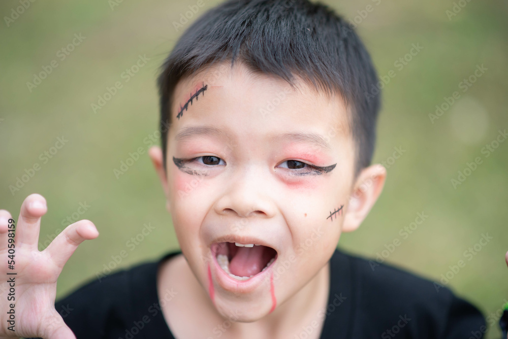 Asian kids play peekaboo halloween face theme Asian kids play peekaboo halloween face theme