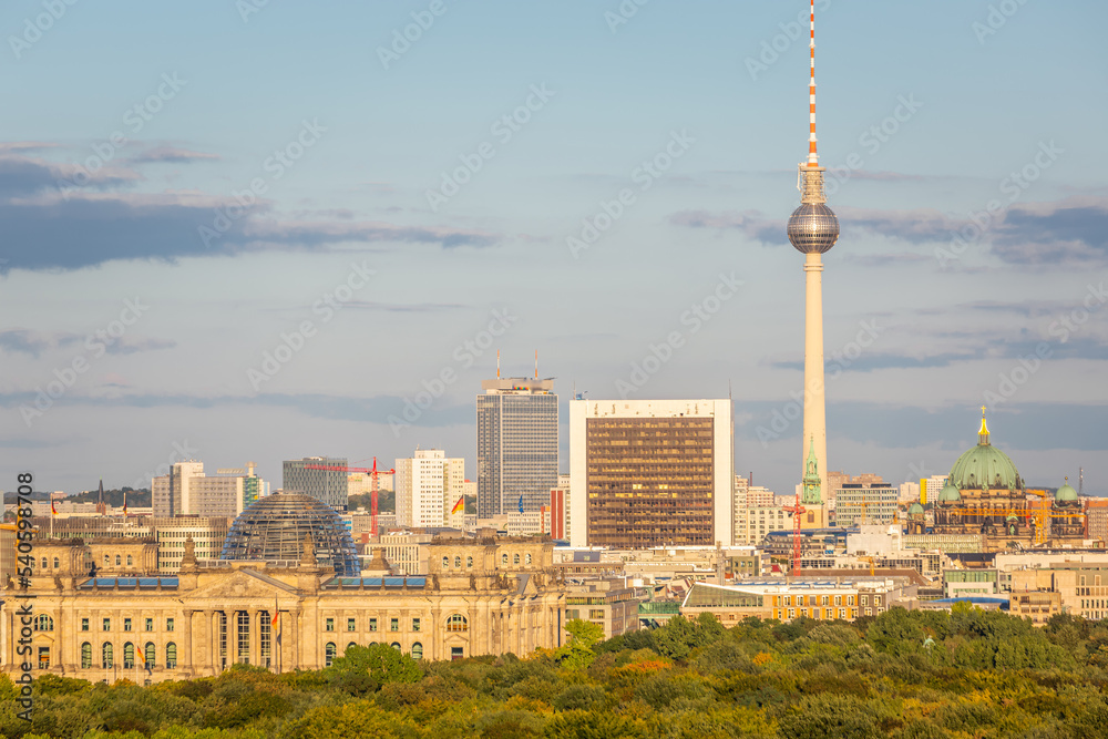 Berlin cityscape skyline over Tiergarten at peaceful sunset, Germany