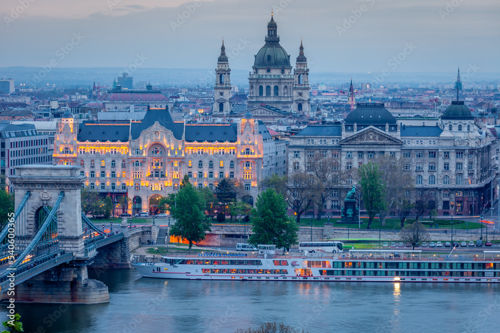 Skyline of Budapest with illuminated cityscape and Basilica at dawn, Hungary