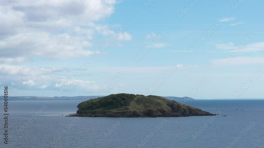 Wide low aerial view of St. Georges Island, off the Cornish coast near the town of Looe. Wide low aerial view of St. Georges Island, off the Cornish coast near the town of Looe.