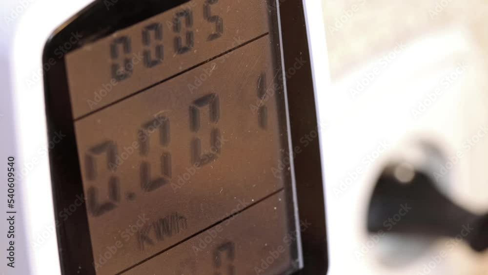 Electricity consumption is measured by a wattmeter plugged into an electrical outlet Electricity consumption is measured by a wattmeter plugged into an electrical outlet