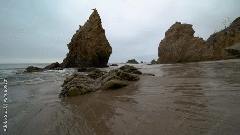 Static shot of Scenic El Matador beach, Rock formations at low tide, Low angle view Static shot of Scenic El Matador beach, Rock formations at low tide, Low angle view