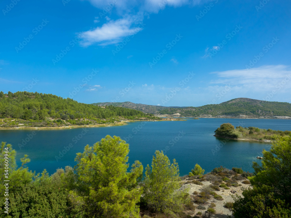 Panoramic view of Gadouras Dam. Solving the important and crucial water supply problems.
Near the villages of Lardos and Laerma in the southern part of the island. Rhodes, Greece.
