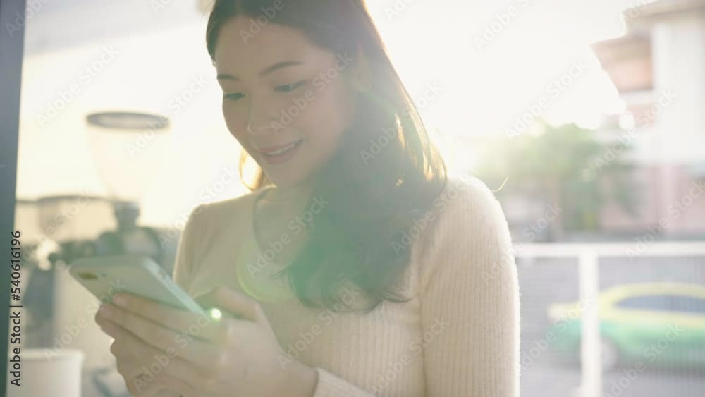 Portrait of beautiful Asian japanese trendy business girl celebrate with smart phone flare light. Success and happy woman education internet technology startup business, office woman