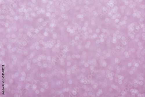 Pink bokeh circle abstract shining background. Blurred glittering wallpaper