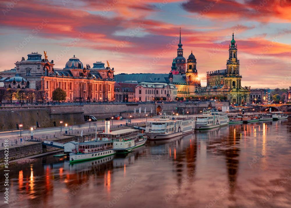 Great evennig view of Cathedral of the Holy Trinity or Hofkirche, Bruehl's Terrace or The Balcony of Europe. Nice autumn sunset on Elbe river in Dresden, Saxony, Germany, Europe.