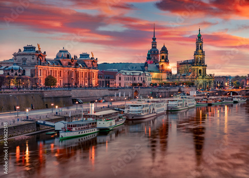 Great evennig view of Cathedral of the Holy Trinity or Hofkirche, Bruehl's Terrace or The Balcony of Europe. Nice autumn sunset on Elbe river in Dresden, Saxony, Germany, Europe.