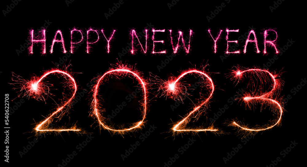 2023 happy new year fireworks celebration written sparkling at night. 2023 happy new year fireworks celebration written sparkling at night.