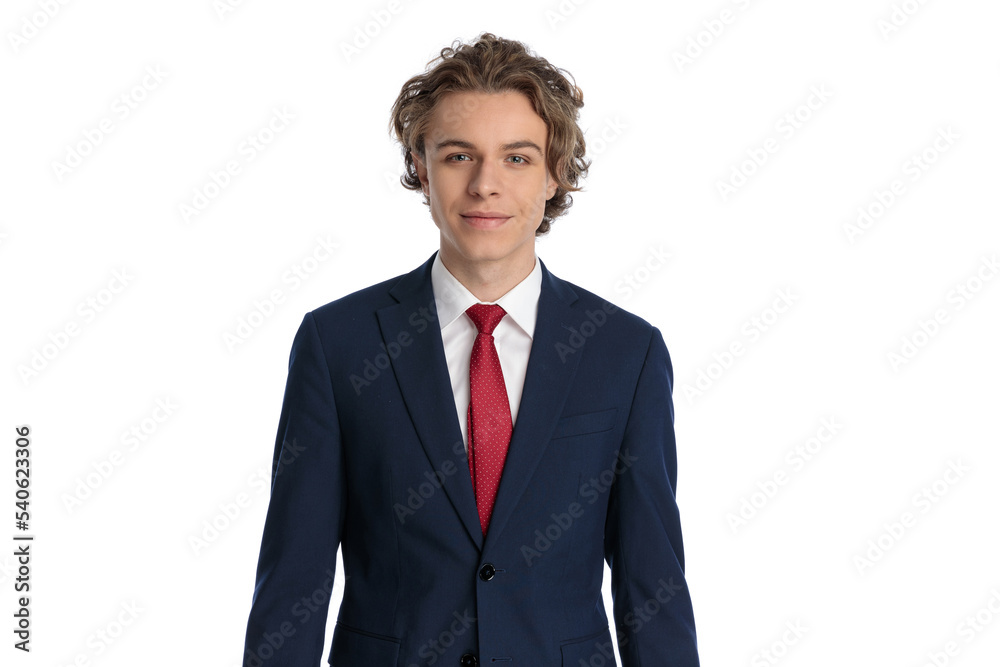 portrait of blond businessman with curly hair smiling and being happy portrait of blond businessman with curly hair smiling and being happy