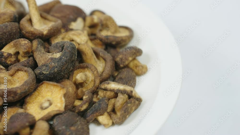 Close up of dried vegetables, mushrooms and background white color Close up of dried vegetables, mushrooms and background white color