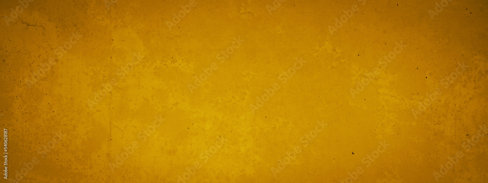 Abstract yellow golden colored spotted stone concrete texture wall wallpaper tiles background banner panorama, long pattern backgrounds.