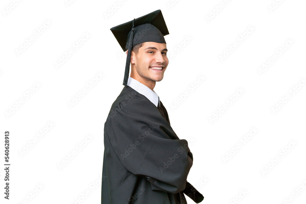 Young university graduate caucasian man over isolated background with arms crossed and looking forward Young university graduate caucasian man over isolated background with arms crossed and looking forward