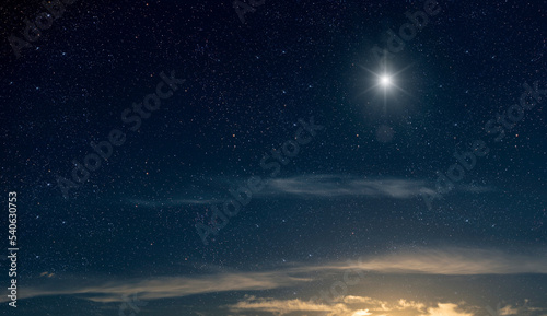 The star shines on the Christmas Eve of Jesus Christ.