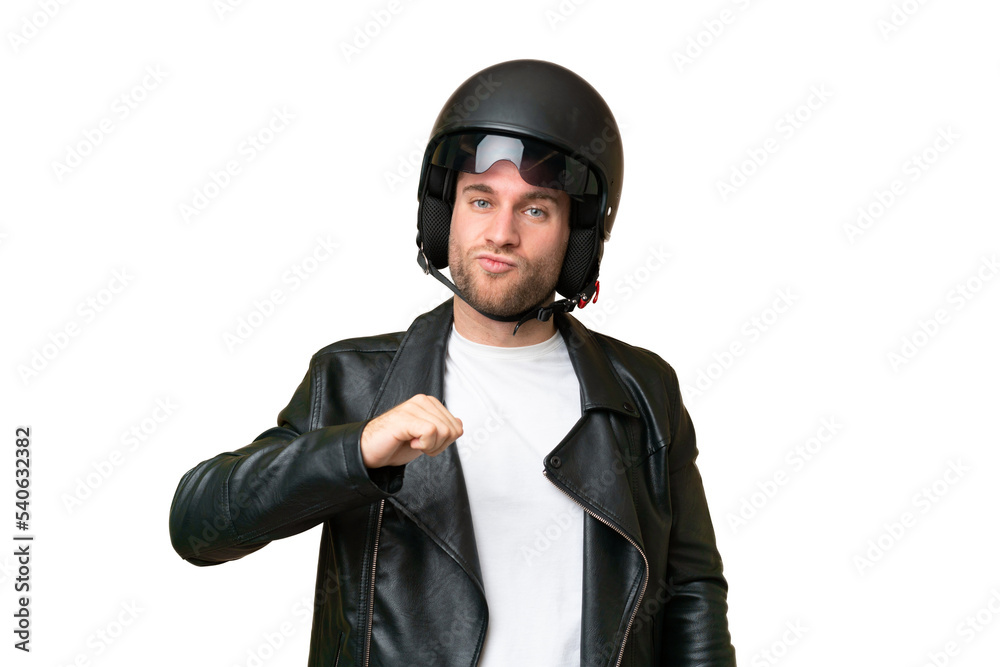 Young caucasian man with a motorcycle helmet isolated on green chroma background proud and self-satisfied Young caucasian man with a motorcycle helmet isolated on green chroma background proud and self-satisfied