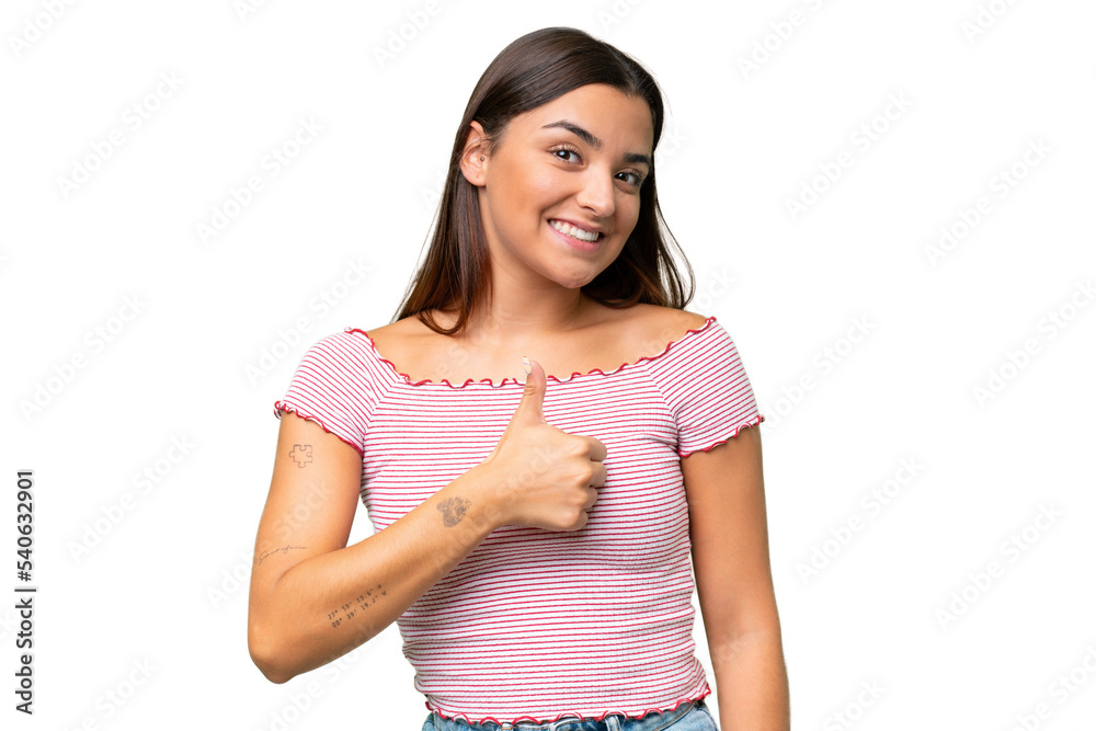 Young caucasian woman isolated on green chroma background giving a thumbs up gesture Young caucasian woman isolated on green chroma background giving a thumbs up gesture