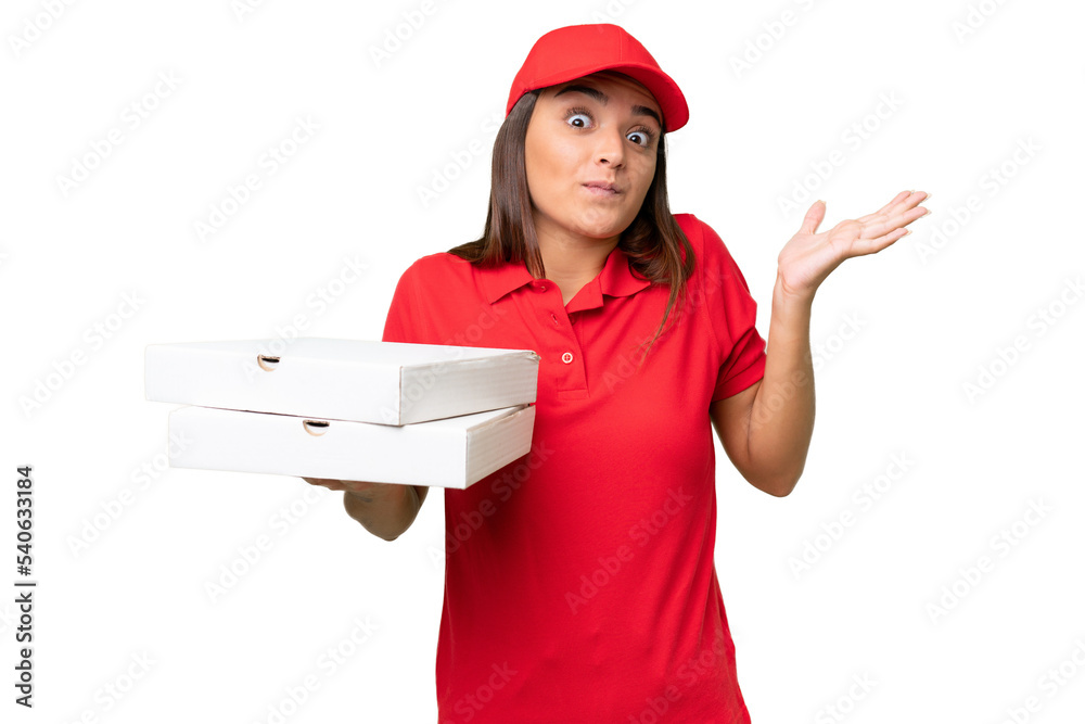 Pizza delivery caucasian woman with work uniform picking up pizza boxes isolated on green chroma background having doubts while raising hands Pizza delivery caucasian woman with work uniform picking up pizza boxes isolated on green chroma background having doubts while raising hands