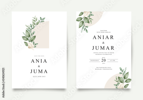 Elegant wedding invitation with flowers and green leaves