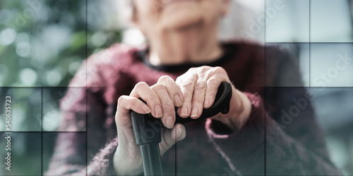 Old woman with her hands on a cane, geometric pattern