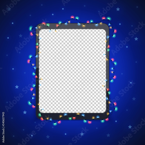 Christmas Tablet with Glowing Lights on Blue