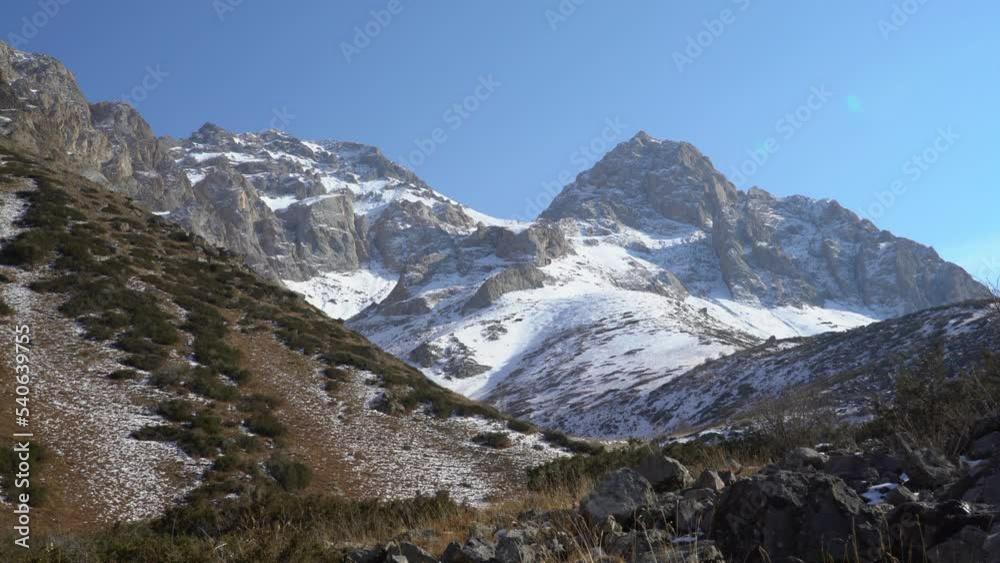 Landscape autumn rocky and snowy mountain