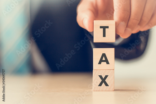 Wallpaper Mural TAX concept, on wooden block. Including of state taxes,tax payment, governant ,calculating finance, tax accounting, statistics and data analytic reserach, calculation tax return, strategy plan, report Torontodigital.ca
