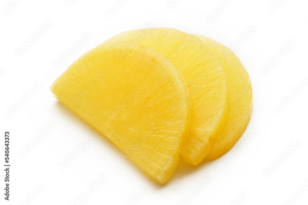Korean yellow pickled radish or Danmuji side dish isolated on white